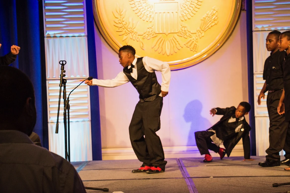 Reed’s Refuge young performers dancing on stage