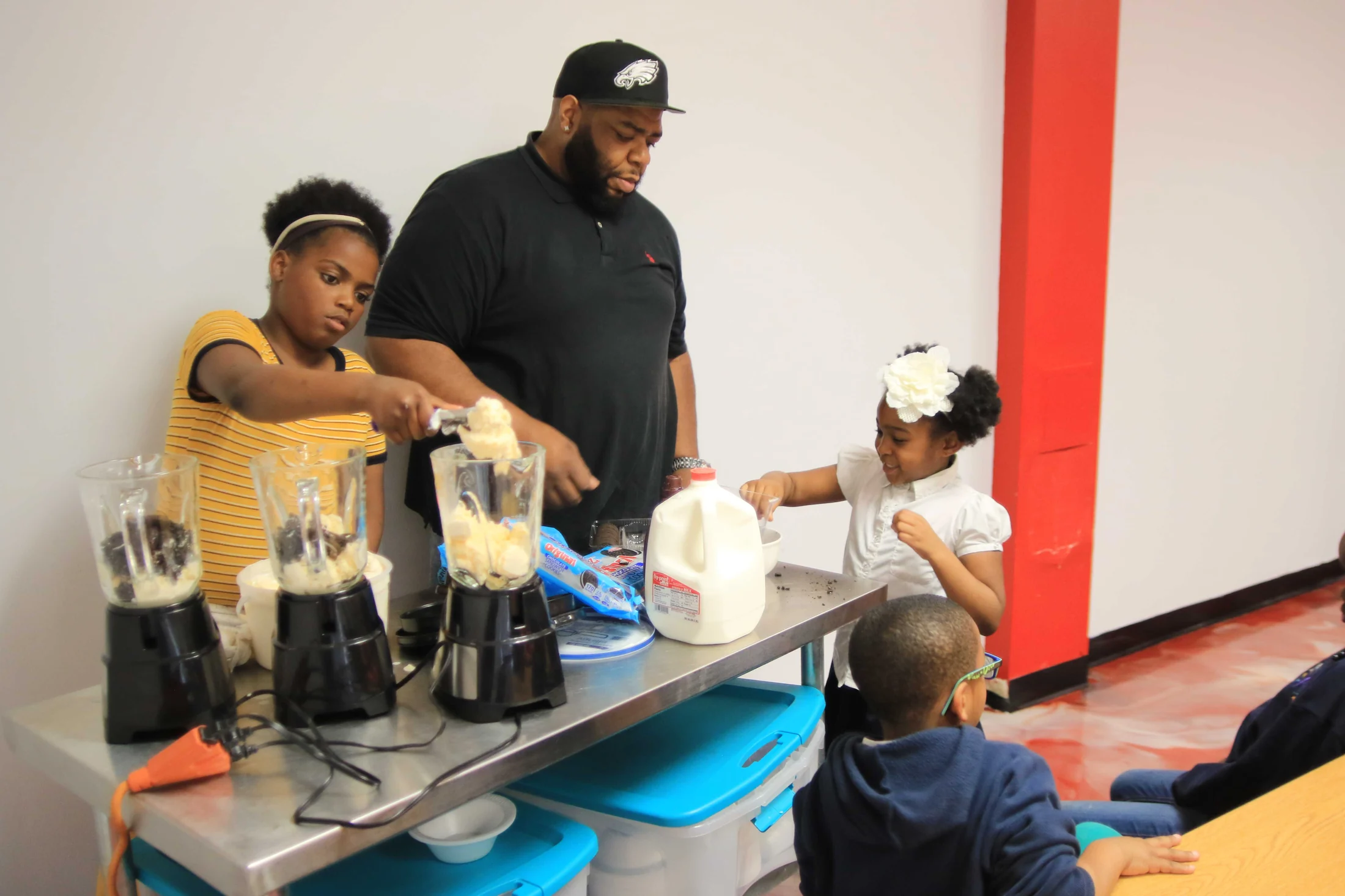 Children preparing food with a mentor during Cooking Without a Stove